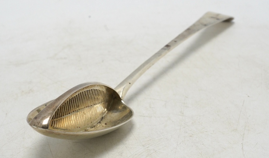 A George III silver Old English pattern basting/straining spoon, Smith & Fearn, London, 1791, 29.6cm, weight 136 grams. Condition - fair